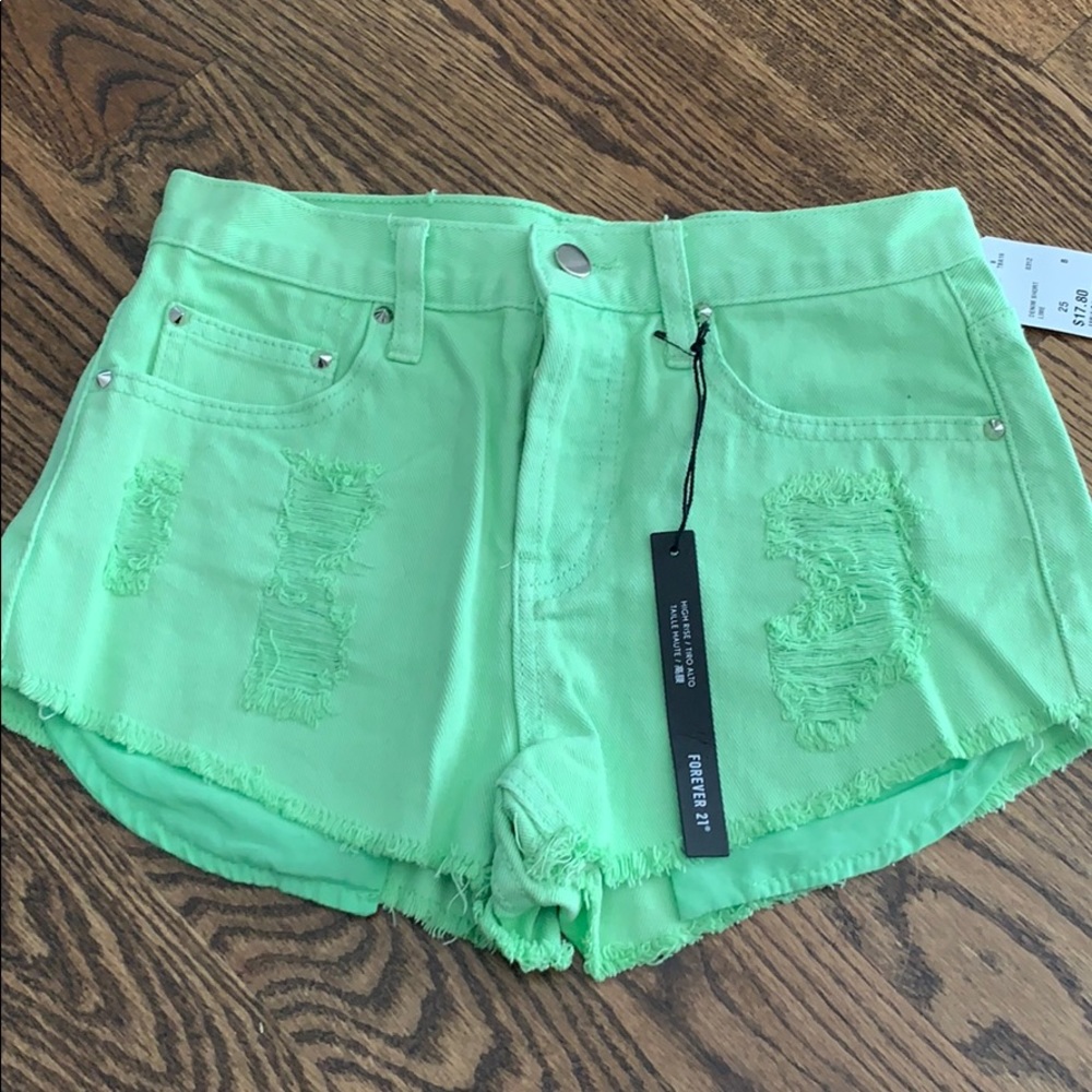 Neon high rise distressed cut off shorts